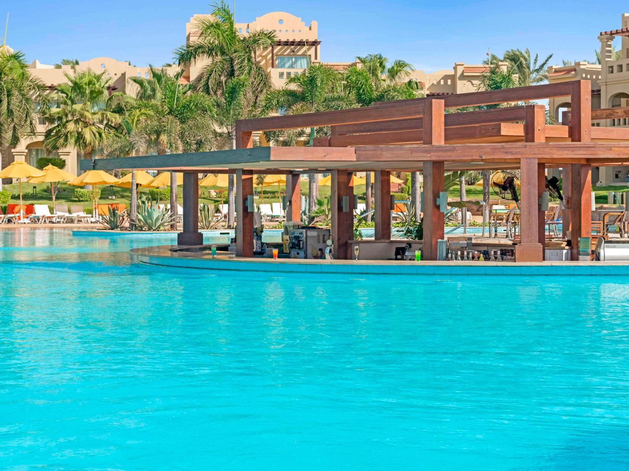 Rixos Sharm El Sheikh (Adults Only) Hotel Exterior photo The swimming pool at the Hilton Sharm El-Sheikh