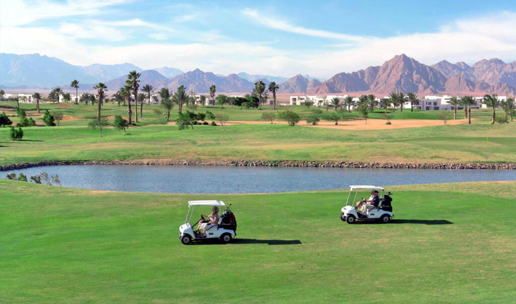 Rixos Sharm El Sheikh (Adults Only) Hotel Exterior photo Golf carts at the El Alamein Golf Club